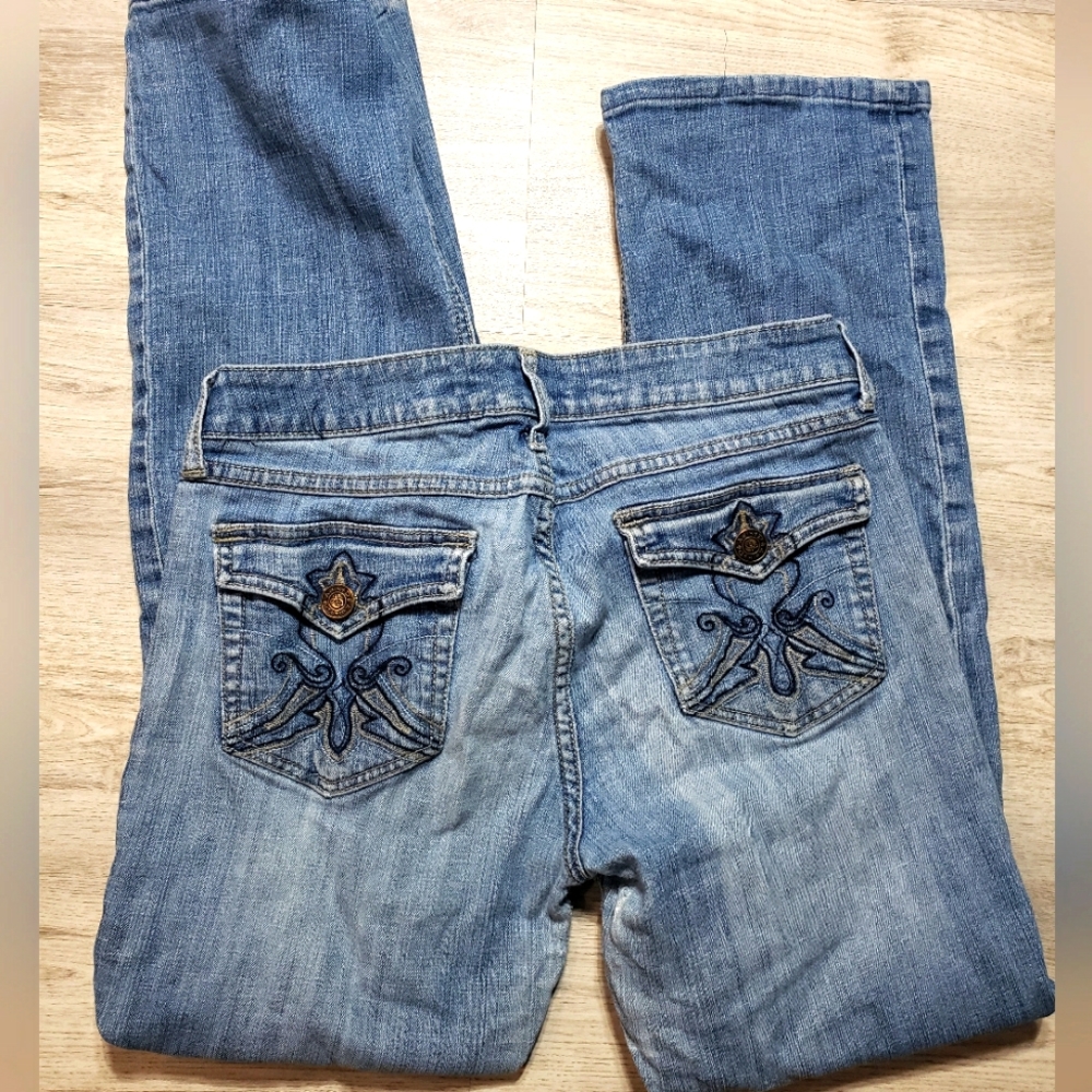 Adiktd flip back embroidery pocket jeans..Button back pocket..Size 10/W31..